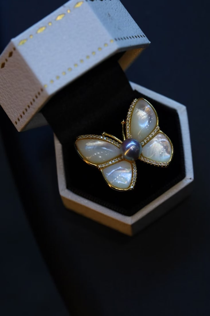 Sterling Silver Natural Akoya Pearl Ring: Title: Sterling Silver Natural Akoya Pearl Ring Description: This ring features natural Japanese Akoya pearls, showcasing rich gold and cool white luster, with minimal blemishes and perfect