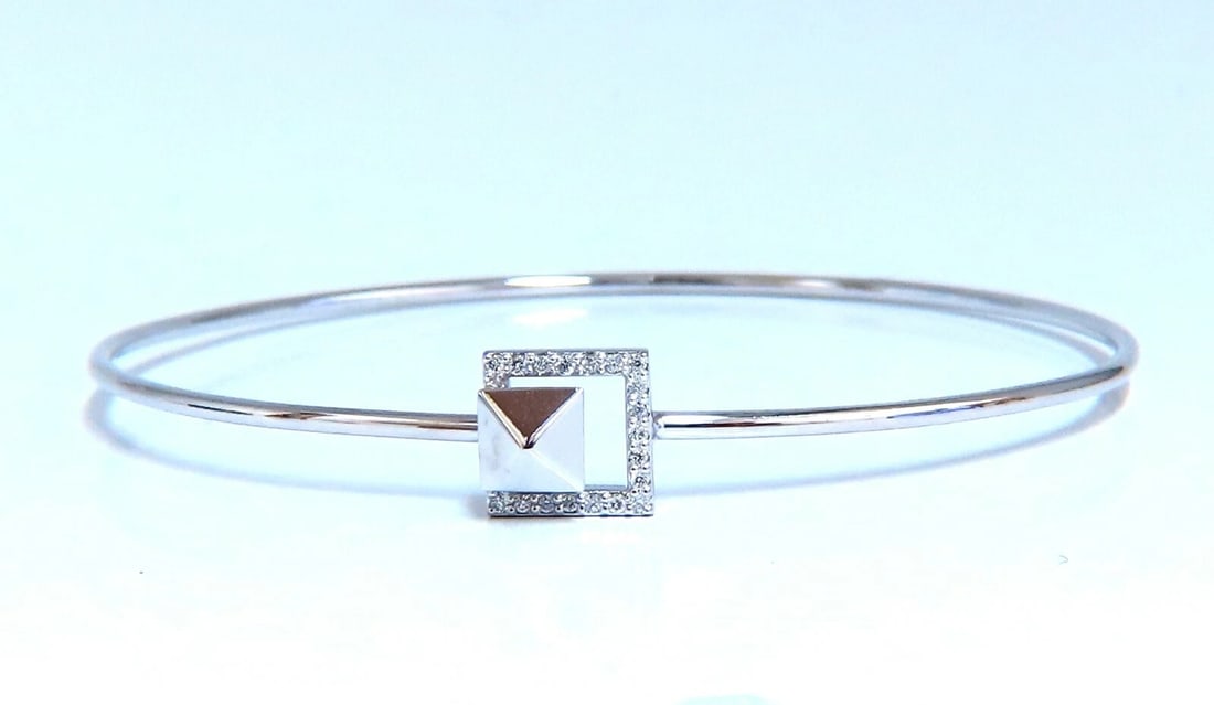 .10ct Natural Diamonds Bangle Bracelet 14kt Gold Floating Pyramid**: Title: .10ct Natural Diamonds Bangle Bracelet 14kt Gold Floating Pyramid** Description: Floating Pyramid Diamond Bangle. .10ct. Natural diamonds bracelet. G-color Vs-2 Clarity 14kt. white gold 5.1 Gra