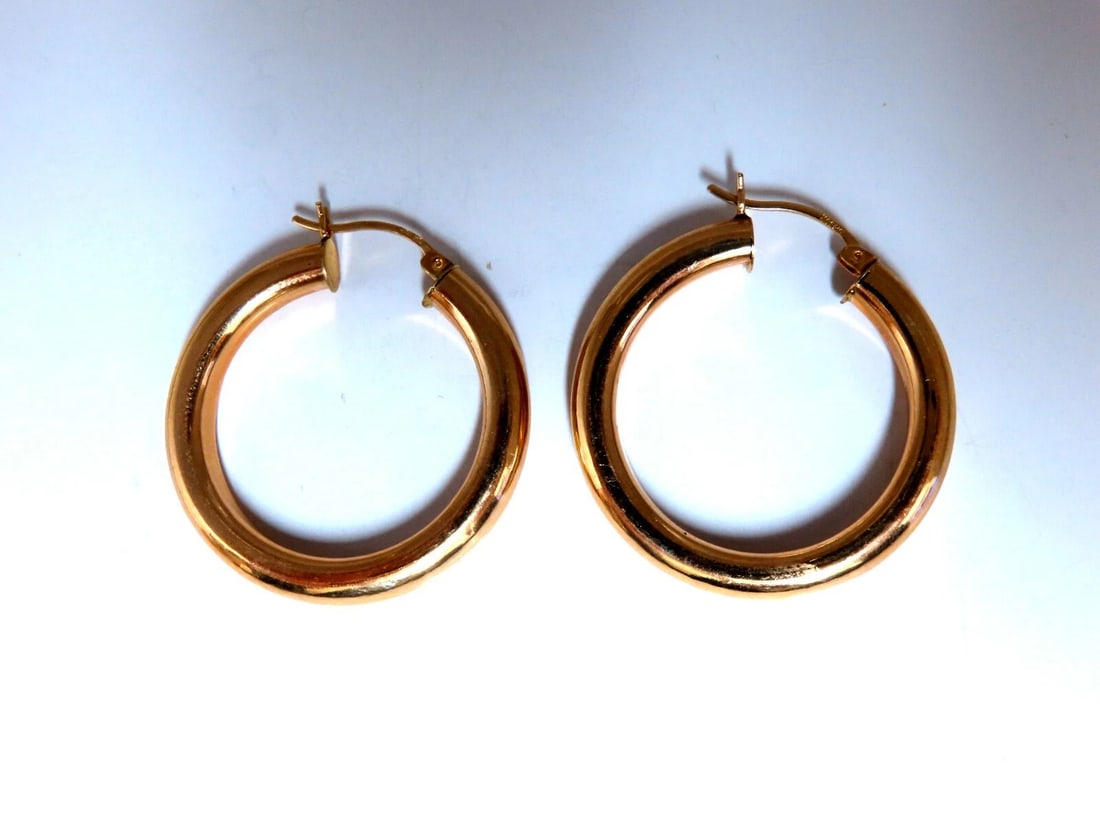 14Kt Gold Hoop Earrings Tubular Plain 1.30 inch diameter**: Title: 14Kt Gold Hoop Earrings Tubular Plain 1.30 inch diameter** Description: Gold Hoop Earrings Measurements of Earrings: 32mm diameter / 1.30 inch 5mm wide. 4.4 grams / 14kt. yellow gold Earrings a