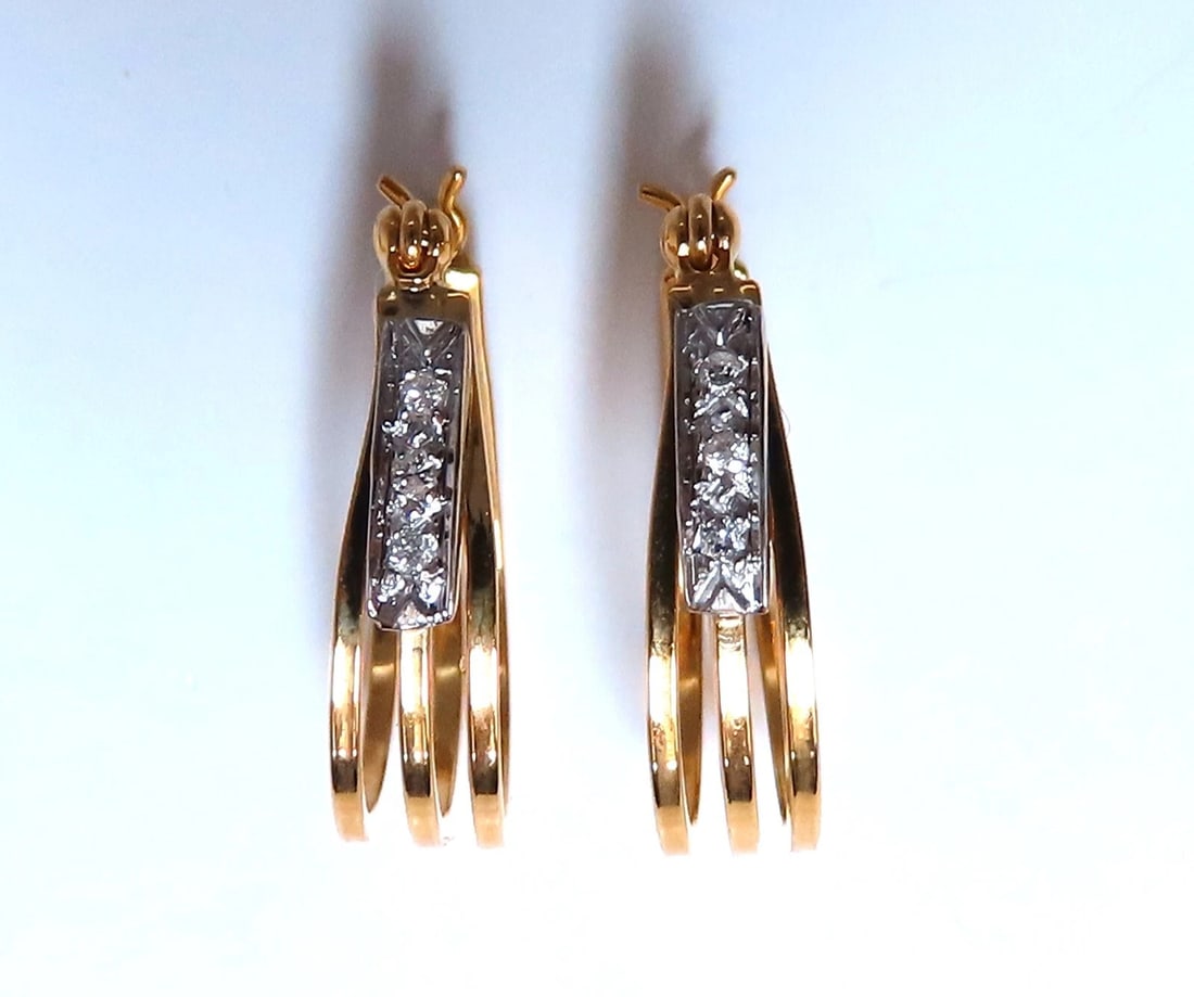 .06ct Natural Diamond Earrings 14kt Gold Semi Hoop**: Title: .06ct Natural Diamond Earrings 14kt Gold Semi Hoop** Description: semi hoop diamond earrings. .06 carat natural round diamonds H color Si1 clarity 14kt yellow gold 2.5 grams Earring measure
