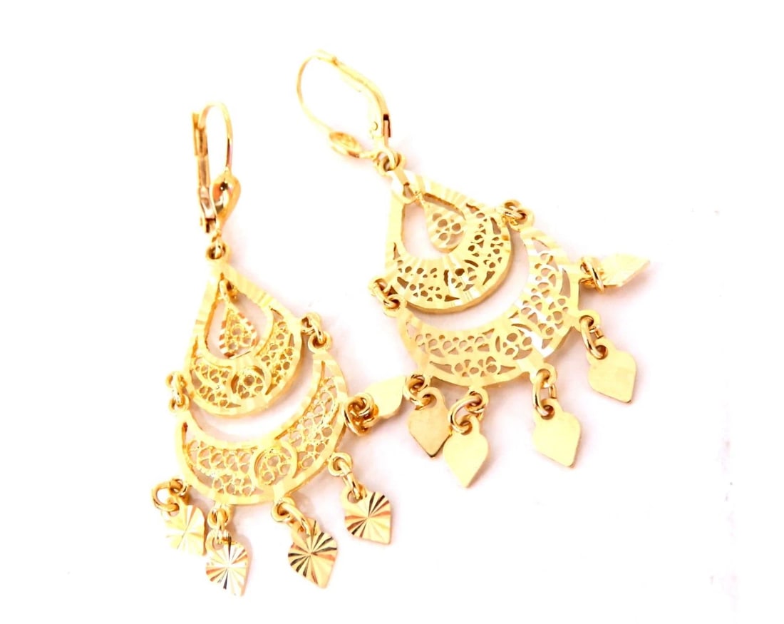 Bohemian Deco 14kt Gold Earrings 14kt**: Title: Bohemian Deco 14kt Gold Earrings 14kt** Description: Bohemian Deco Dangle Tribal Earrings Measurements of Earrings: 2 Inch Diameter .65 inch diameter Comfortable Lever 5.2 grams / 14kt. Yellow
