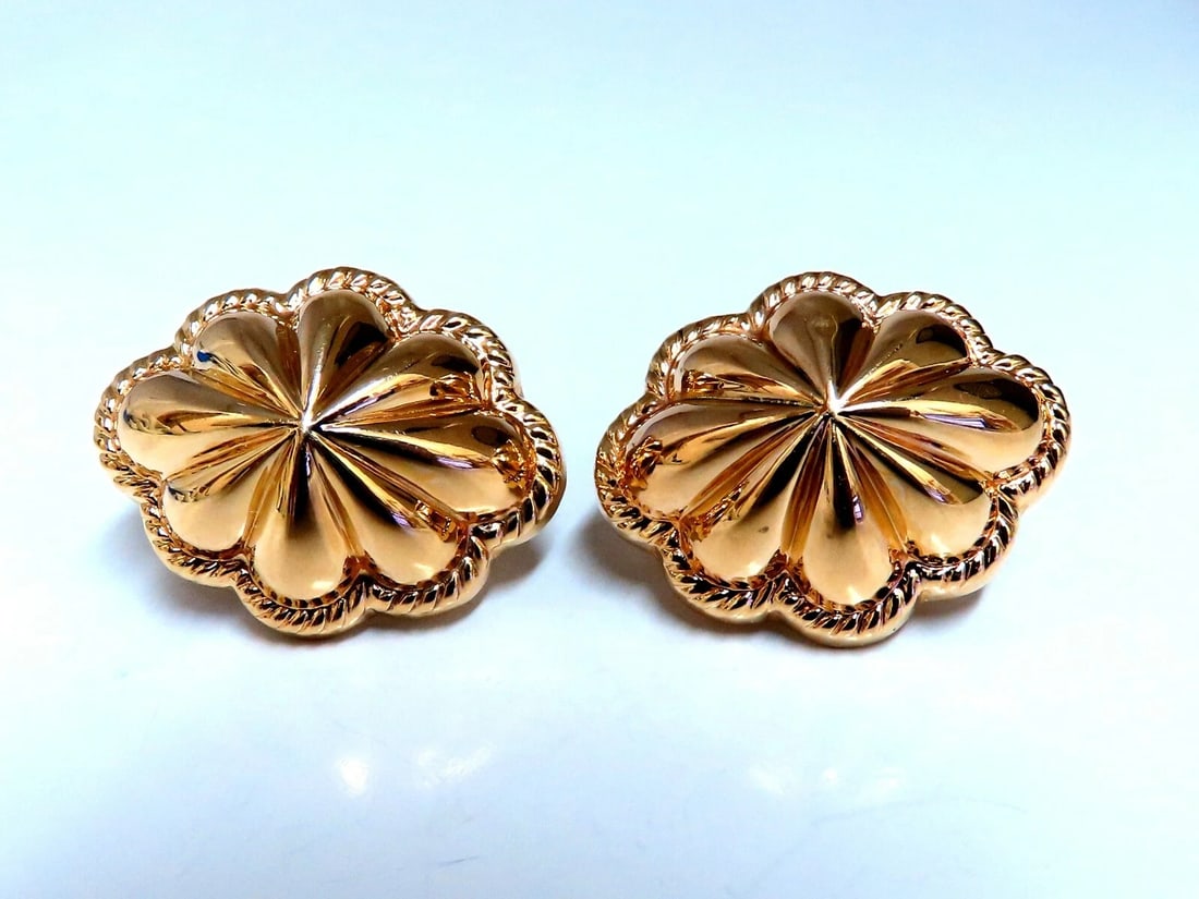14kt Gold Textured Watermelon Clip Earrings **: Title: 14kt Gold Textured Watermelon Clip Earrings ** Description: Watermelon Clip Earrings Measurements: 1.09 x .88 Inch Depth: .37inch Comfortable Omega Clips 8.9 grams / 14kt. Yellow Gold Earrings 