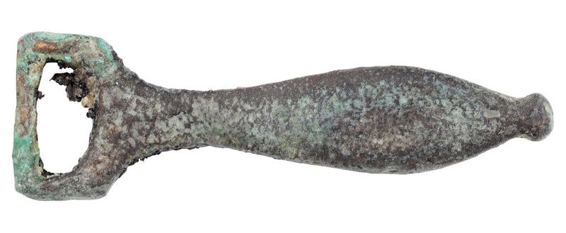 ROMAN LEGIONARY’S SWORD BELT TERMINAL, 2nd-3rd CENTURY AD: Bronze, tear drop form, just over 1 ¼” (1.30”) length. Elegantly made with short spurs at the loop and elongated baluster body. Used after the mid second century through the third