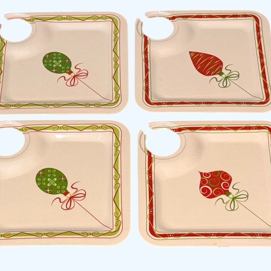Set of Eight Mid-20th Century Melamine Christmas Party Plates with Cup Holders: This festive set of eight mid-20th century melamine party plates features a charming Christmas motif, perfect for holiday entertaining. Each square plate is designed with a convenient cup holder