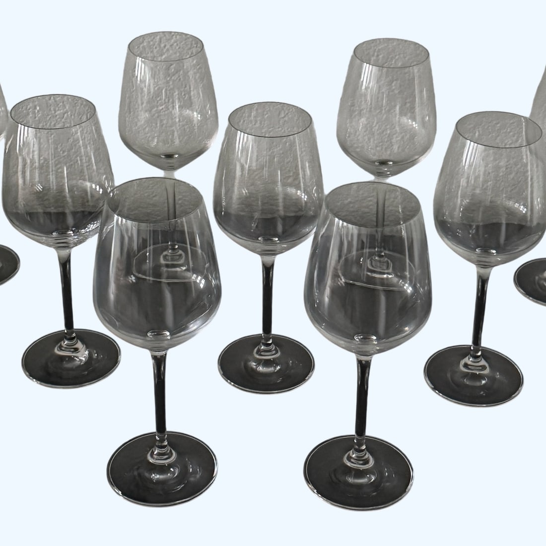 Set of Nine Clear Glass Wine Glasses: Set of 9, clear 7oz wine glasses Dimensions: Height - 9" Width - 3.5" (each) Depth - 3.5" (each) Weight - 5 lbs (total) Your purchase is protected: In the rare event that the item did not conform to
