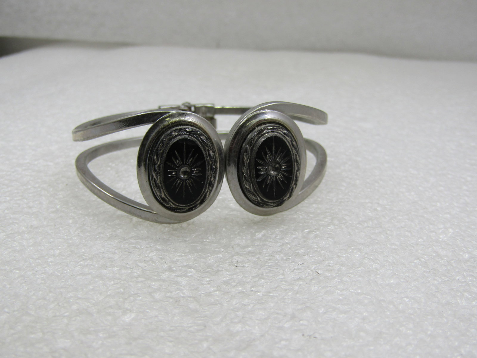 Vintage Top Opening Hinged Cameo Style Cuff Bracelet, 7": Vintage Top Opening Hinged Cameo Style Cuff Bracelet, 7". SIlver tone with the hinge at the back and opens on top. Will fit a 7" wrist and close but will not have movement but will close and not press