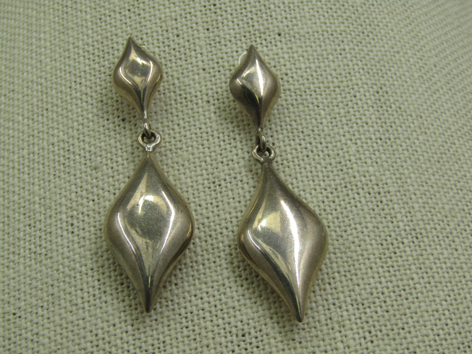Vintage Sterling Pointed Stud & Drop Earrings, Pierced, 2": Vintage Sterling Pointed Stud & Drop Earrings, Pierced, 2" long. The stud is appx. 3/8" wide adn the bottom is slightly over 1/2" wide. These are puffy and 2.5mm thick on the stud and 6mm on the dangl