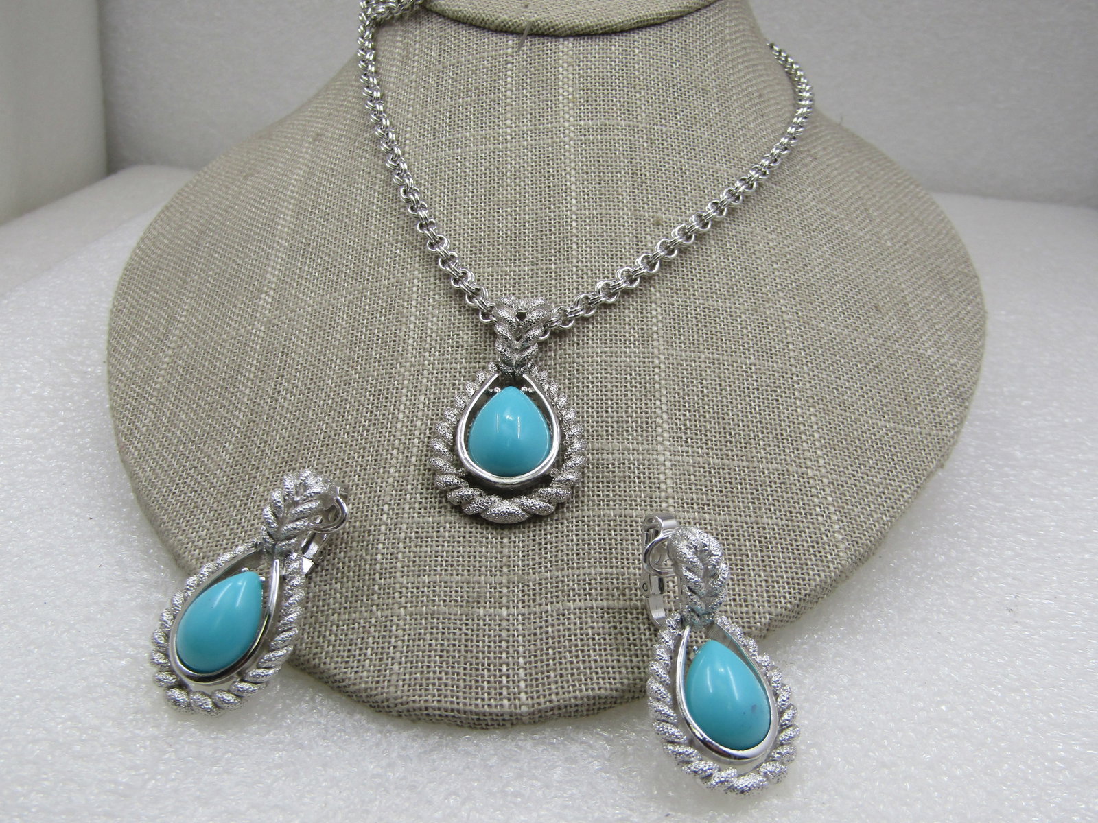 Vintage Faux Turquoise Necklace & Clip Earrings Set, Avon: Vintage Faux Turquoise Necklace & Clip Earrings Set, Avon, Southwestern appeal. Double strand, double link chain , 4mm wide. Staggered lengths - one is 18" and the other 22". The pendant hangs from