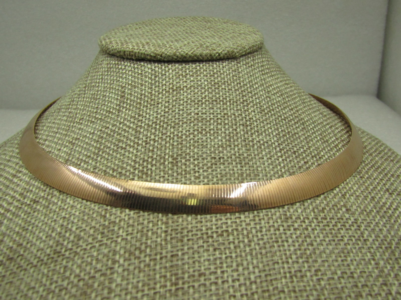 Dyadema Bronze Omega Two-Side Necklace, 17": Dyadema Bronze Omega Two-Side Necklace, 17", 8mm. Italy. One side is a thin omega link and the other side is a textured design - can be worn either way. Hang Tag marked Dyadema Bronze Italy. Lobster