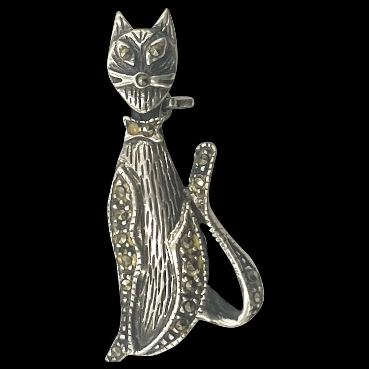 Vintage Sterling Silver Marcasite Tall Cat Brooch/Pin- Signed: Title: Vintage Sterling Silver Marcasite Tall Cat Brooch/Pin- Signed Description: Vintage Sterling Silver Marcasite Tall Cat Brooch/Pin- Signed Hallmarked: 925 Weighs 4 grams Measures Approx. 1.50 x .