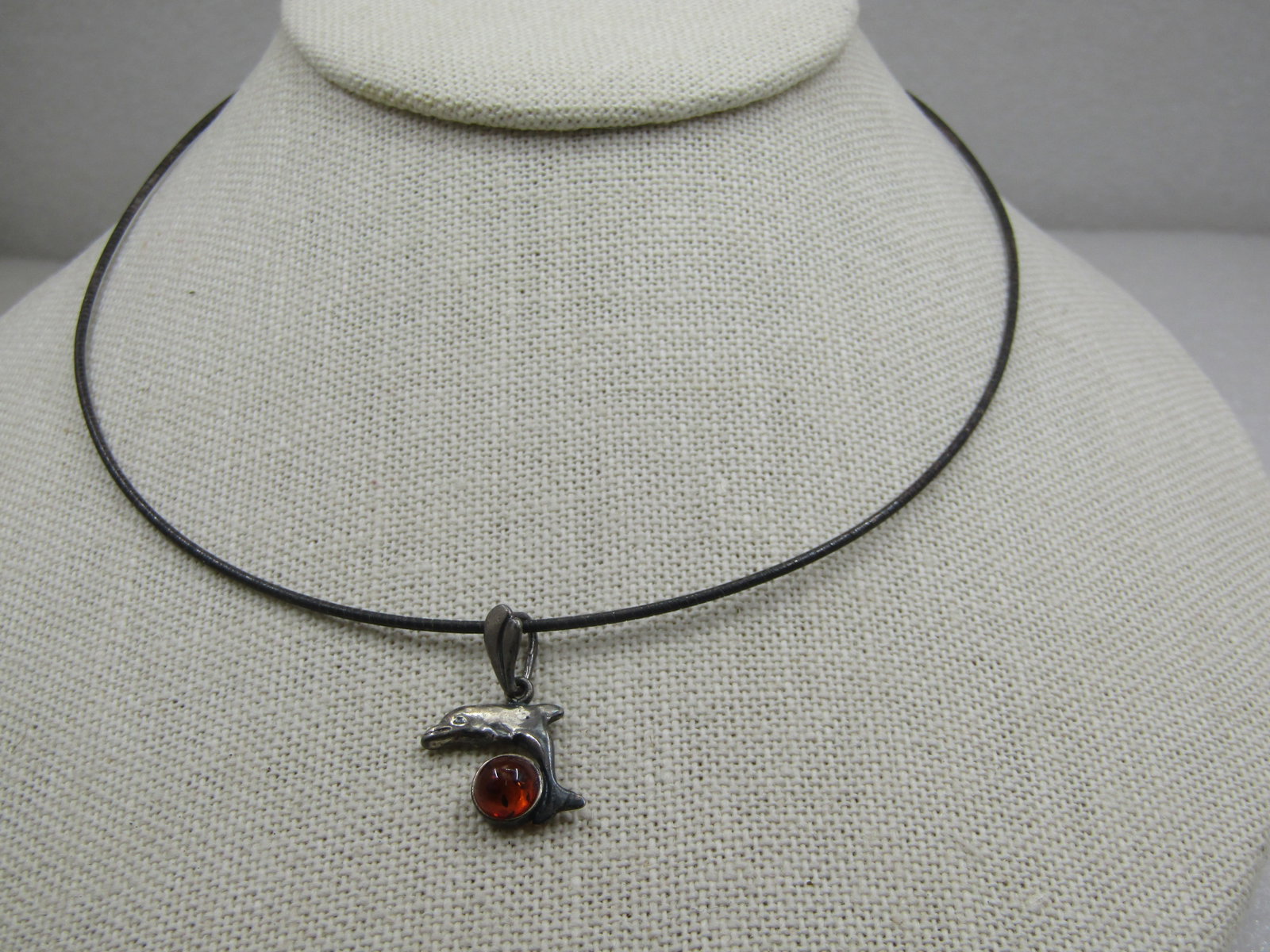 Vintage Sterling Amber Dolphin Necklace, Round Omega Necklace 16", 1980's: Vintage Sterling Amber Dolphin Necklace, Round Omega Necklace 16", 1980's.. The necklace is rounded and wire-like with an omegal type wrapped look and is appx. 1.2mm with lobster clasp. It is marked