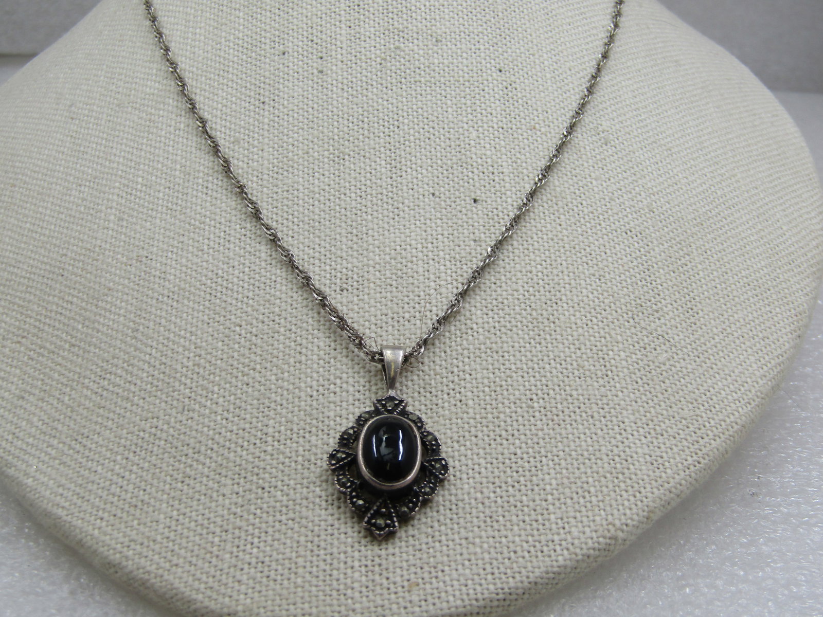 Vintage Sterling Onyx Marcasite Necklace, 20", Signed: Vintage Sterling Onyx Marcasite Necklace, 1980's, 20", Signed with an unknown named and marked .925 and Thailand. Tested and both the pendant and chain test as sterling and weigh appx. 7.25 grams. The