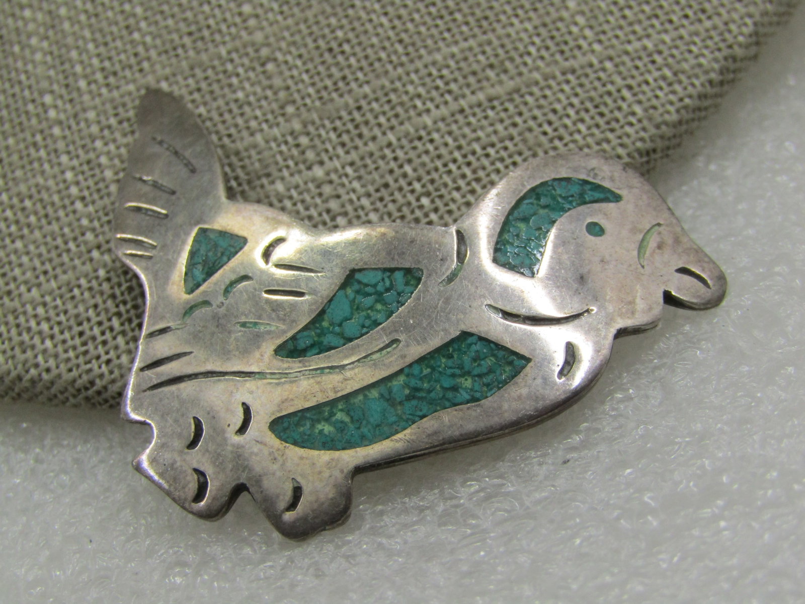 Vintage Sterling Turquoise Bird Brooch, 1960's-1970's, Taxco, Mexico: Vintage Sterling Turquoise Bird Brooch, 1960's-1970's, Taxco, Mexico. Signed T4-102, Mexico, .925. Weight is appx. 12.95 gr. It is 2" wide and 1.5" tall and weight is appx. 13.17gr. It is slightly dom