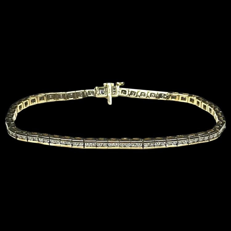 Estate 14k Yellow Gold 2 Carat Diamond Tennis Bracelet: Title: Estate 14k Yellow Gold 2 Carat Diamond Tennis Bracelet Description: Estate 14k Yellow Gold 2 Carat Diamond Tennis Bracelet Hallmarked: 14k Approx. 2 Carats Total Weight (Approx. 101 Diamonds)