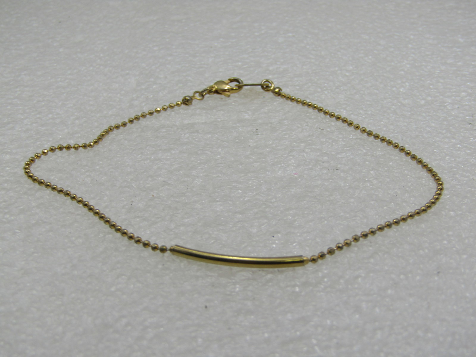 10kt G.F. Ankle Bracelet, Bead Link & Bar Center, 10": 10kt G.F. Ankle Bracelet, Bead Link & Bar Center, 10", This has a center curved 1.8mm 1" curved bar with bead links on each side making up the 9" remaining inches of the 10" anklet. The bead link is
