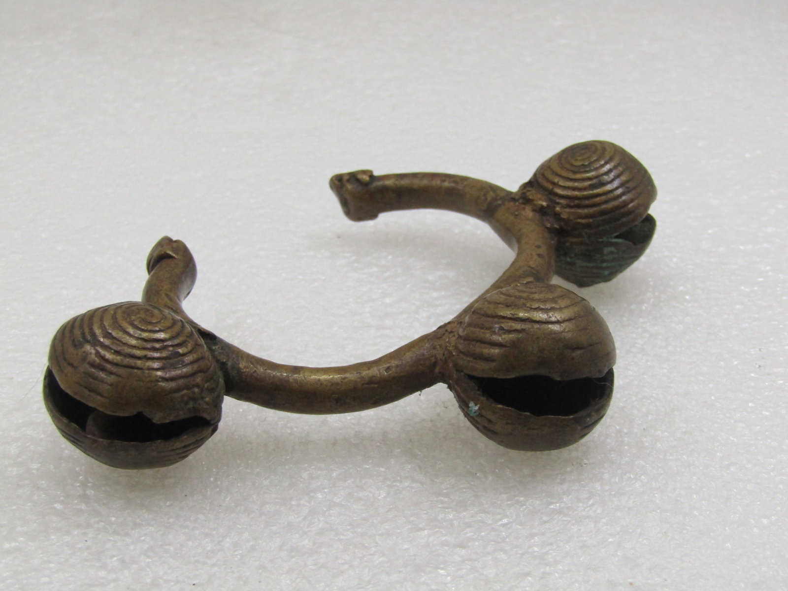 Antique African Tribal Bronze Bell Cuff Bracelet, 6.25": Antique African Bronze Bell Cuff Bracelet, 6.25" that includes the opening at the back. heavy cast/forged bracelet with thre bells on them and a wider accent on the ends. Admittedly I do not know