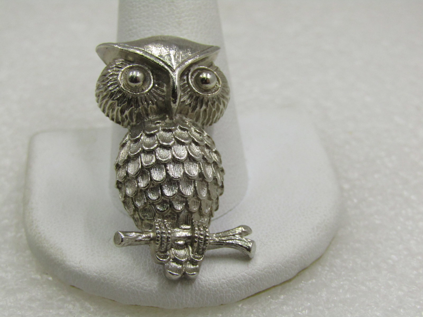 Vintage Owl on Branch Brooch, 1960's-1970's. 1.5": Vintage Owl on Branch Brooch, 1960's-1970's. 1.5" tall and 3/4" wide. Silver tone with textured and smooth and shiny surfaces. Not signed by the maker. Very good condition. (W11321.6 SS6762 AZ LEB*