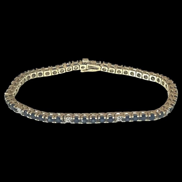 Estate 14k Yellow Gold Sapphire Diamond Tennis Bracelet: Title: Estate 14k Yellow Gold Sapphire Diamond Tennis Bracelet Description: Estate 14k Yellow Gold Sapphire Diamond Tennis Bracelet Hallmarked: Tested 14k Approx. 2 Carats Sapphires (Quantity of 45)