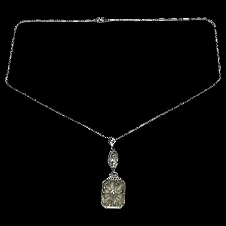 Vintage 14k White Gold Filigree Diamond and Natural Rock Crystal Quartz Necklace: Title: Vintage 14k White Gold Filigree Diamond and Natural Rock Crystal Quartz Necklace Description: Vintage 14k White Gold Filigree Diamond and Natural Rock Crystal Quartz Necklace Hallmarked: 14k