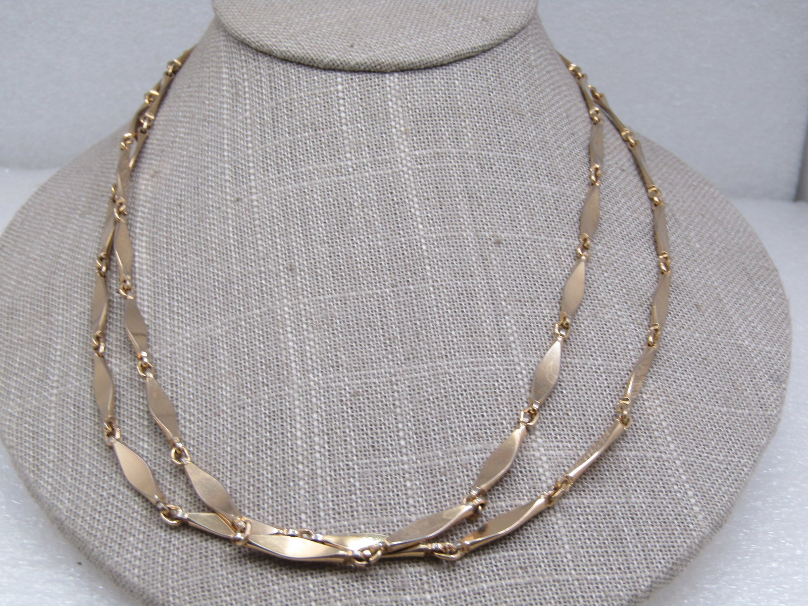 Vintage Gold Tone Tapered Bar Link Necklace 38", Gold Tone: Vintage Gold Tone Tapered Bar Link Necklace 38", Gold Tone. 1970's Flat, curved, and tapered link with spring clasp. Not signed by the maker. Very good condition. (INV. CO71914.8 SS6317 J LD 1/1/22