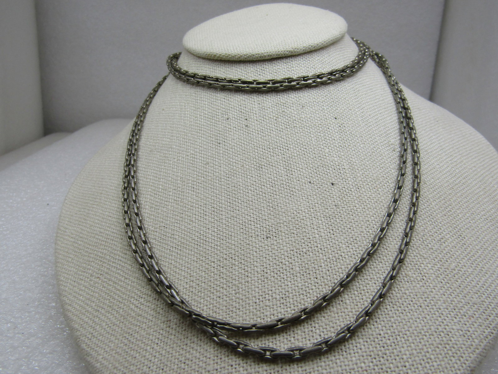 Vintage Silver Plated Bar Link Necklace 60": Vintage Silver Plated Bar Link Necklace 60" and appx. 2.5mm round. Similar to a boston link. The metal has a slight positive silver content but it is a plating and not sterling. Can be doubled over.