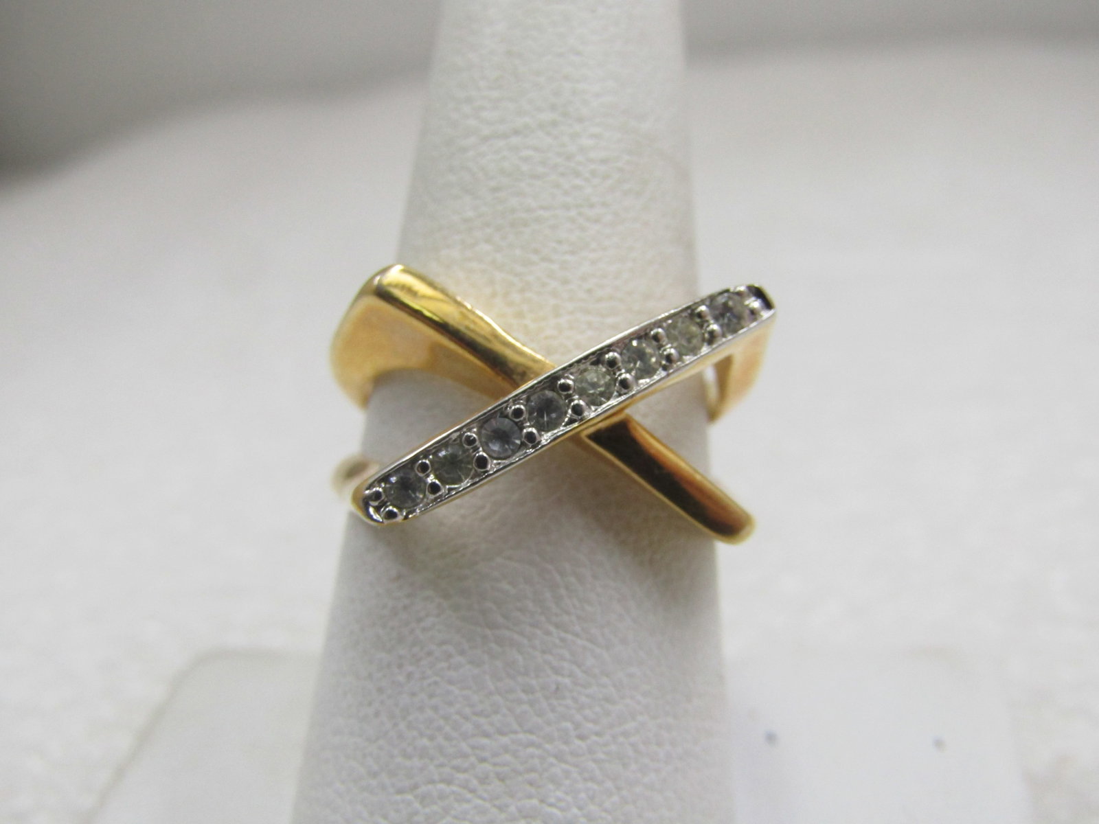 Vintage 18kt Plated Two-Tone, CZ X Ring, Sz. 8.5, Signed: Vintage 18kt Plated Two-Tone, CZ X Ring, Sz. 8.5, Signed with an A inside a circle frame. The x has czs set in white plated gold and the rest of the ring is yellow plated. The X is appx. 19mm across