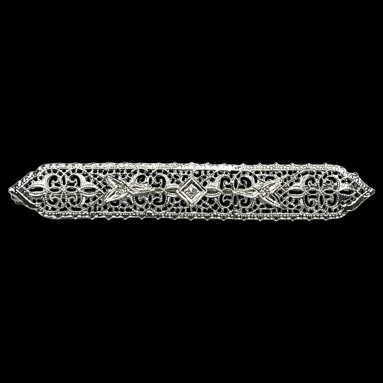 Art Deco 14k White Gold Filigree Diamond Brooch/ Pin: Title: Art Deco 14k White Gold Filigree Diamond Brooch/ Pin Description: Art Deco 14k White Gold Filigree Diamond Brooch/ Pin Hallmarked: 14k White Gold Approx. .15 Carat Total Weight (3 Diamonds)