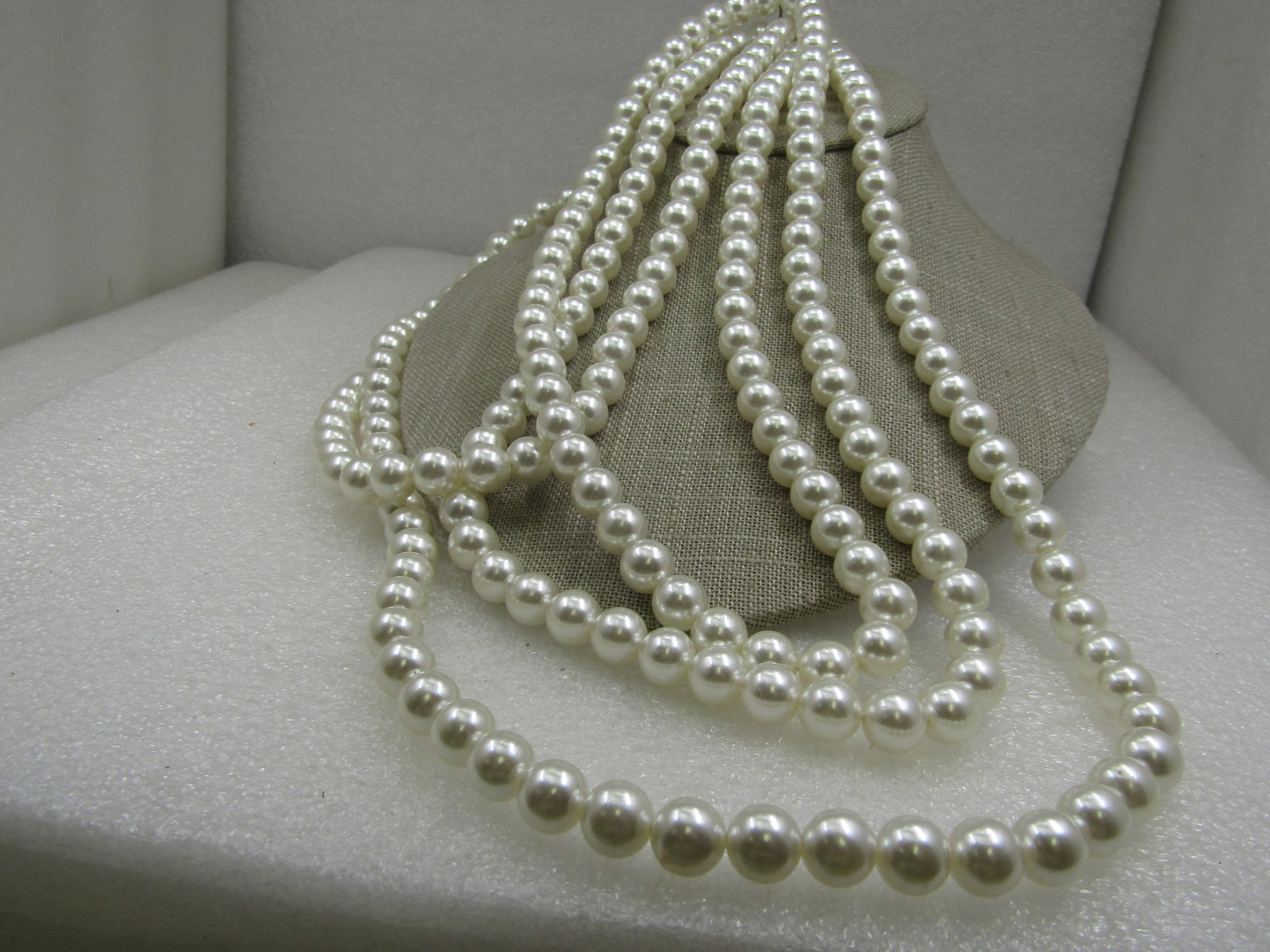 Vintage Pearl Necklace, Sterling Box Clasp. 88", 9.5mm White Faux Pearls: Vintage Pearl Necklace, Sterling Box Clasp. 88", 9.5mm White Faux Pearls. Snow white faux pearls that can be doubled or tripled, worn and knotted. The cateye filigree box clasp is marked sterling and