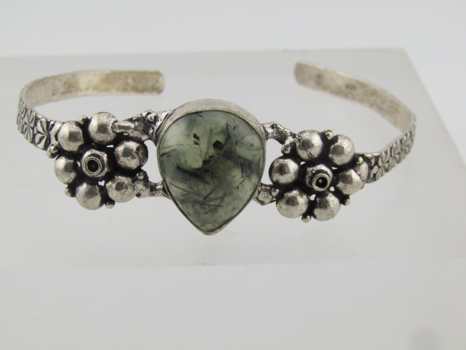 Silver Southwestern Style Cuff Bracelet, Green Stone 8", 1980's-1990's: Silver Southwestern Style Cuff Bracelet, Green Stone 8", 1980's-1990's. This is marked .925 but it does not test as sterling. It is a silver tone metal alloy. It has a primitive handmade design with