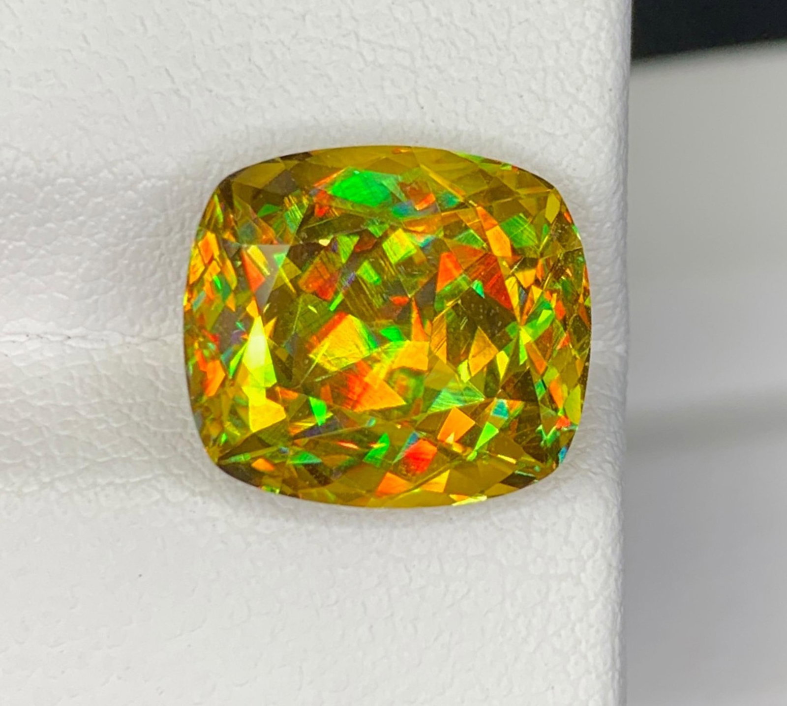 Lustrous Sphene Titanite Fancy Cushion Gemstone: 8.48 Carat Multi Color Titanite, June Birthstone: Title: Lustrous Sphene Titanite Fancy Cushion Gemstone: 8.48 Carat Multi Color Titanite, June Birthstone Description: Gemstone: Sphene Weight : 8.48 cts Dimensions : 12 * 10.8 * 7.9 MM Color : Multi