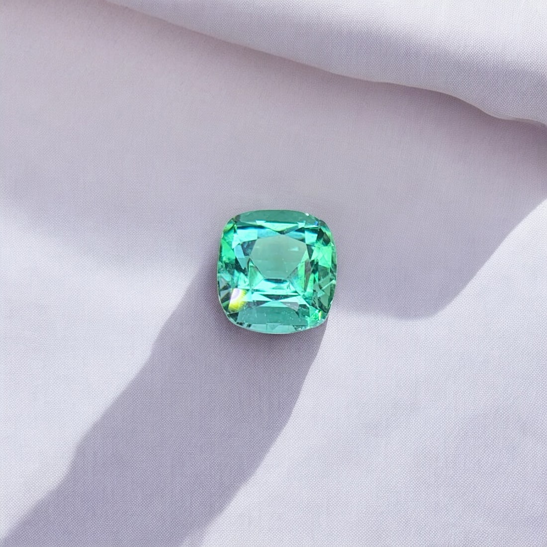 Bluish Green Tourmaline Ring Stone, Natural Tourmaline Gemstone For Jewelry: Title: Bluish Green Tourmaline Ring Stone, Natural Tourmaline Gemstone For Jewelry Description: Dimensions (mm) 6 x 6 x 4.5 mm Weight (cts) 1 Cushion Colours Description Bluish Green Tourmaline Ring