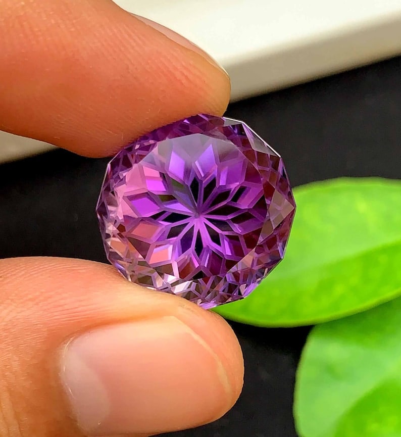 Flower Cut Amethyst Gemstone: Natural February Birthstone, 28.55 Carats: Flower Cut Amethyst Gemstone: Natural February Birthstone, 28.55 Carats Decsription: Natural Amethyst Gemstone, Precision Flower Cut Amethyst Gemstone, Perfect Cut, Faceted Gemstone February