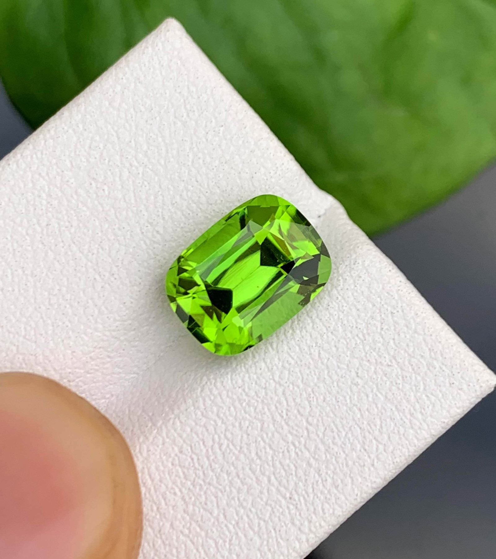 Natural Green Peridot Gemstone: Cushion Cut, August Birthstone, Pakistan Origin: Title: Natural Green Peridot Gemstone: Cushion Cut, August Birthstone, Pakistan Origin Description: Gemstone: Peridot Carat weight: 4.15 Natural Peridot Gemstones, Cushion Cut Peridot Loose Gemstone
