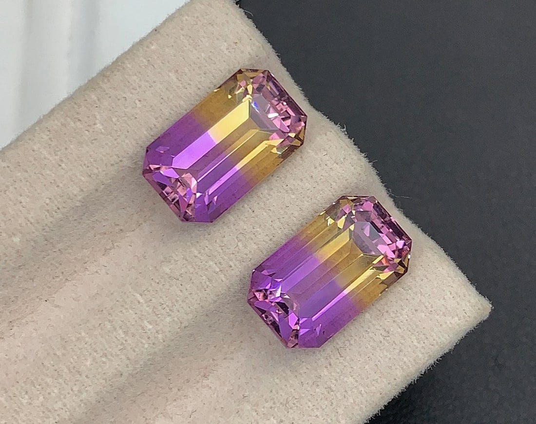 Emerald Cut Bolivian Ametrine Gemstone Pair: 10.10 CT, Royal Purple/Mango Yellow: Title: Emerald Cut Bolivian Ametrine Gemstone Pair: 10.10 CT, Royal Purple/Mango Yellow Description: Gemstone: Ametrine Emerald Cut Bolivian Ametrine Gemstone Pair: Royal Purple/Mango Yellow Propertie