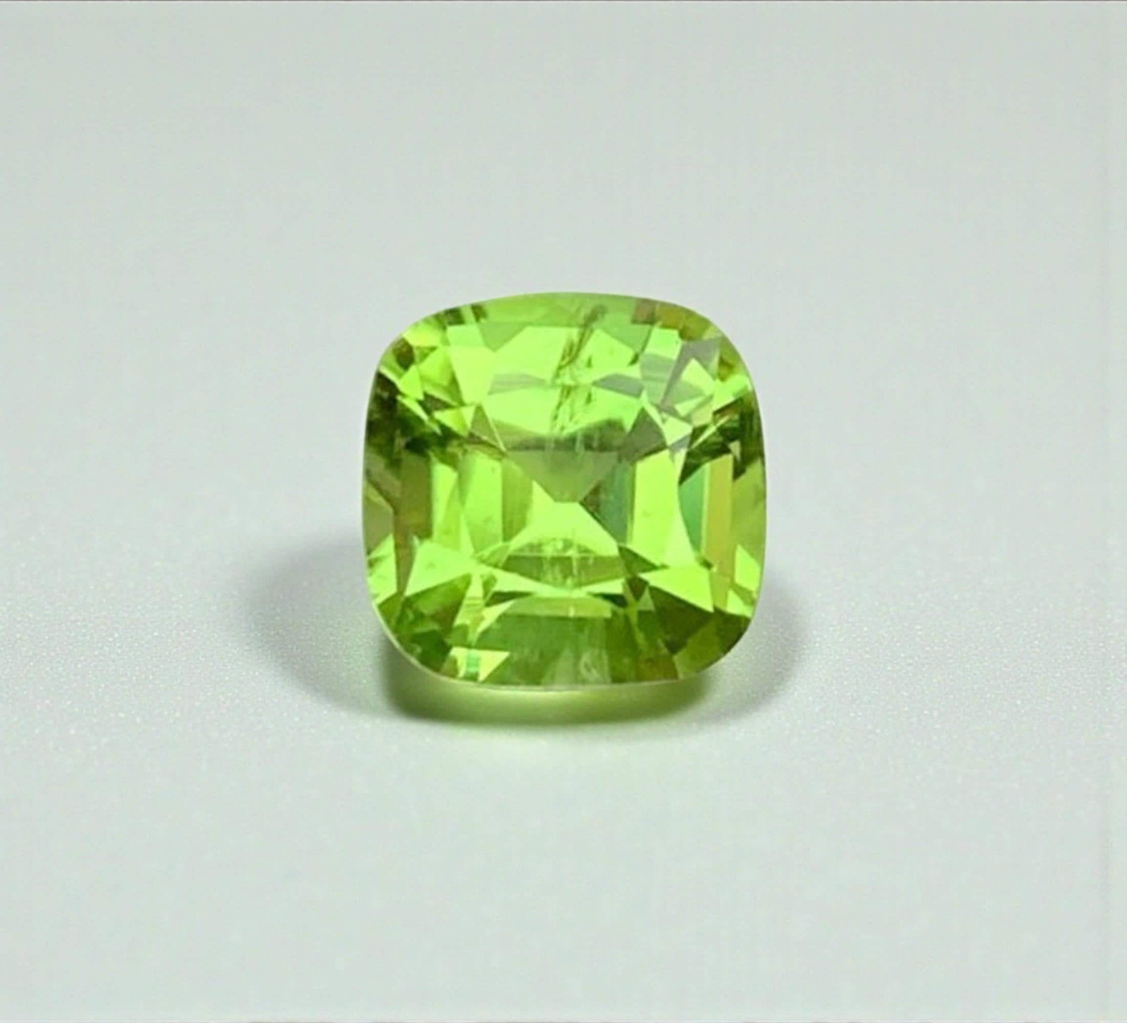 Natural Green Peridot Gemstone: Cushion Cut August Birthstone: Title: Natural Green Peridot Gemstone: Cushion Cut August Birthstone Description: Gemstone: Peridot Carat weight: 1.46 Natural Peridot Gemstones, Cushion Cut Peridot Loose Gemstone From Pakistan,