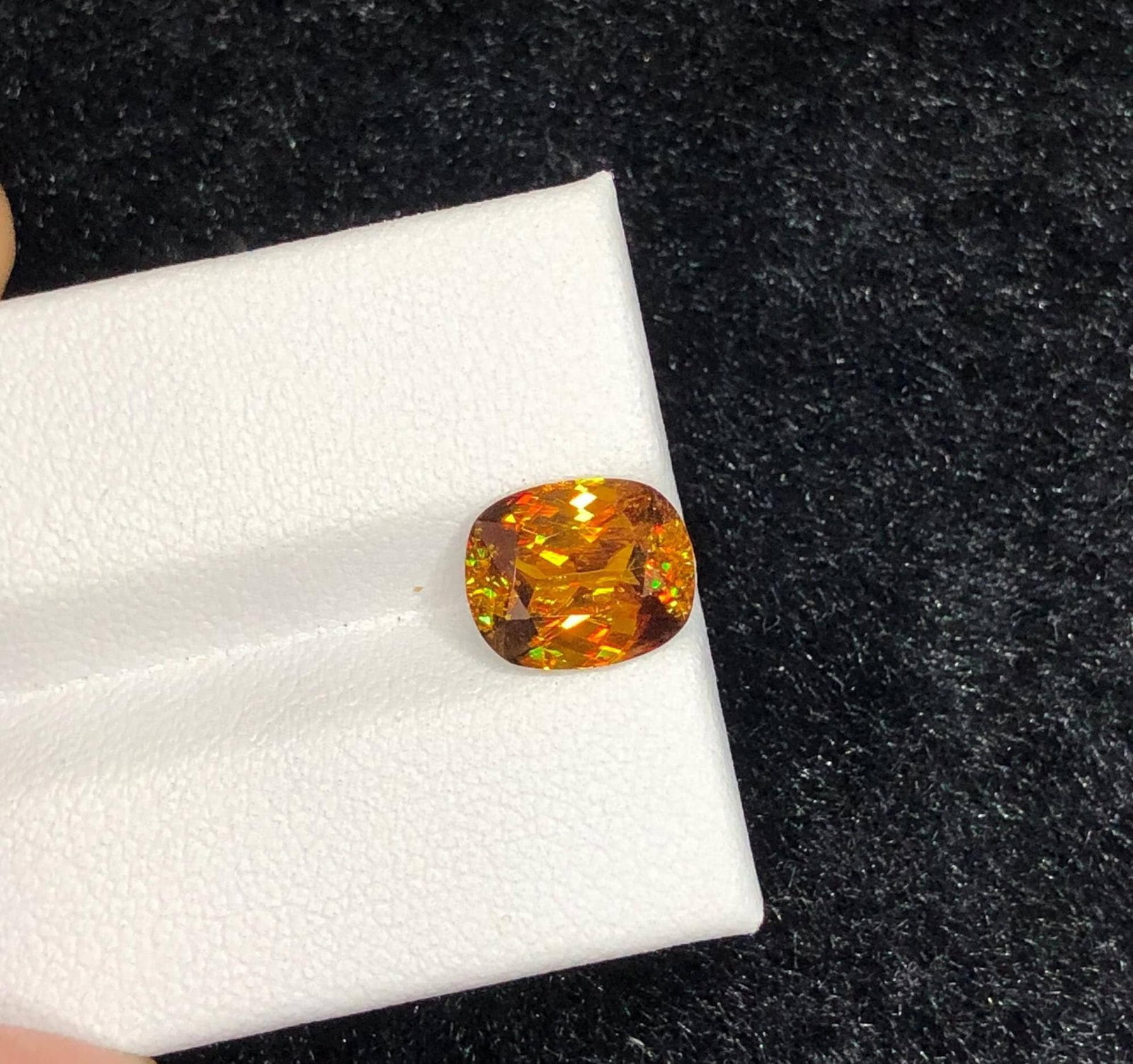 Fire Sphene Gemstone: 2.70 Carat Cushion Cut Titanite: Title: Fire Sphene Gemstone: 2.70 Carat Cushion Cut Titanite Description: Gemstone: Sphene Carat weight: 2.70 This stunning full fire sphene titanite loose gemstone features a captivating cushion cut 