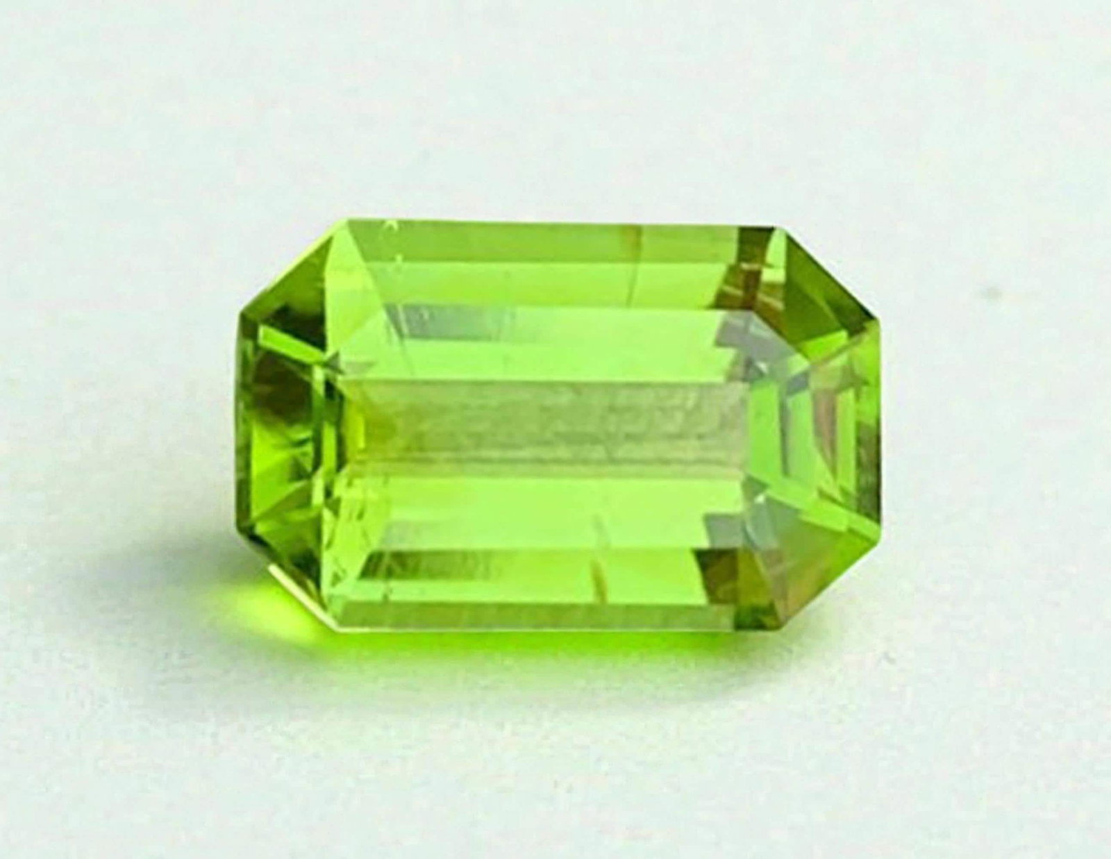 Emerald Cut Peridot Gemstone: Natural August Birthstone, Pakistan Origin: Title: Emerald Cut Peridot Gemstone: Natural August Birthstone, Pakistan Origin Description: Gemstone: Peridot Carat weight: 2.60 Natural Peridot Gemstones, Top Color Emerald Cut Peridot Loose