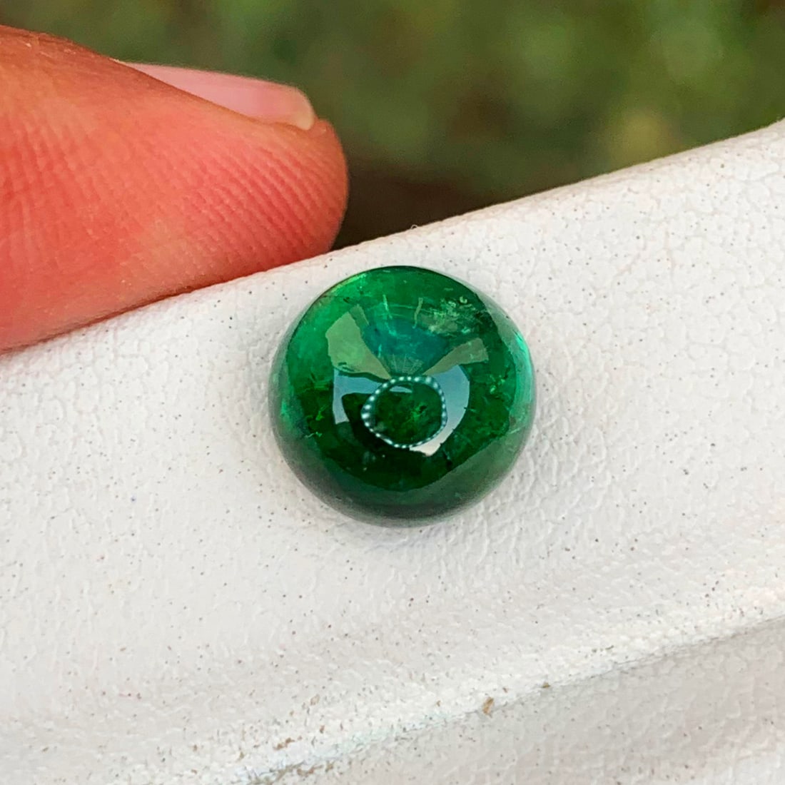 Deep Green Tourmaline Cabochon, Natural Tourmaline Ring Stone: Title: Deep Green Tourmaline Cabochon, Natural Tourmaline Ring Stone Description: Dimensions (mm) 9 x 9 x 6 mm Weight (cts) 3.55 Round Cabochon Colours Description Deep Green Tourmaline Cabochon,