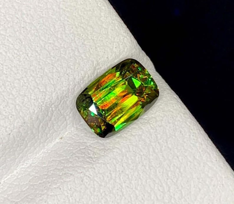 Green Chrome Sphene Gemstone: Lustrous Cushion Cut Titanite, June Birthstone: Title: Green Chrome Sphene Gemstone: Lustrous Cushion Cut Titanite, June Birthstone Description: Natural Chrome Sphene Titanite Gemstone, Full Fire Lustrous Green Sphene Cushion Cut for Ring June