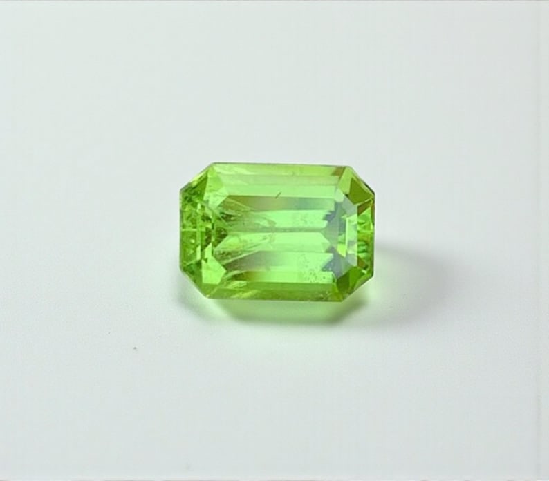 Emerald Cut Peridot Gemstone: Natural August Birthstone (1.47 Carats): Title: Emerald Cut Peridot Gemstone: Natural August Birthstone (1.47 Carats) Description: Natural Peridot Gemstones, Emerald Cut Peridot Loose Gemstone From Pakistan, August Birthstone weight : 1.47