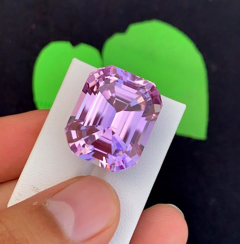 Natural Pink Kunzite Gemstone: 80.80 Carat Emerald Cut, November Birthstone: Title: Natural Pink Kunzite Gemstone: 80.80 Carat Emerald Cut, November Birthstone Description: Natural Pink Kunzite Gemstone, Collector's Choice Faceted Fancy Emerald Cut, For Jewelry, November Birth