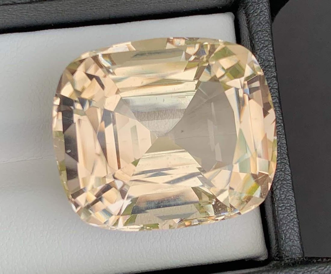 Natural Imperial Topaz Gemstone: Golden Cushion Cut, 75.60 Carats: Title: Natural Imperial Topaz Gemstone: Golden Cushion Cut, 75.60 Carats Description: Gemstone: Topaz Natural Imperial Topaz Gemstone, Gold Color Faceted Cushion Cut For Jewelry, November Birthstone