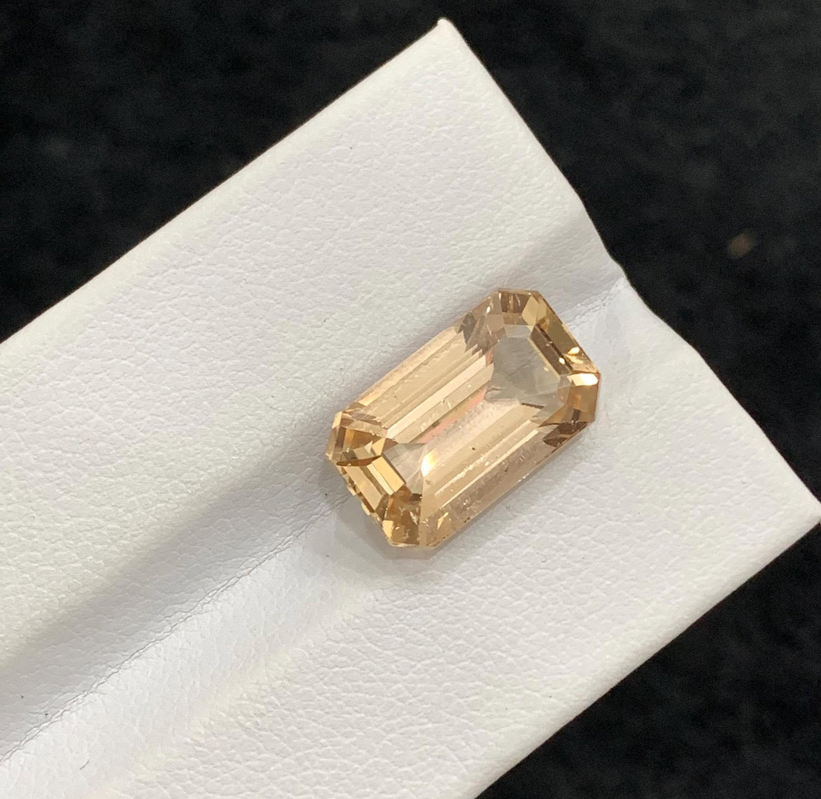 Golden Topaz Gemstone: 10.35 Carat Emerald Cut, Skardu Origin: Title: Golden Topaz Gemstone: 10.35 Carat Emerald Cut, Skardu Origin Description: Gemstone: Topaz Carat weight: 10.35 : • Weight : 10.35 carat • Dimension : 14.6*8.9*7.7 mm • Color: