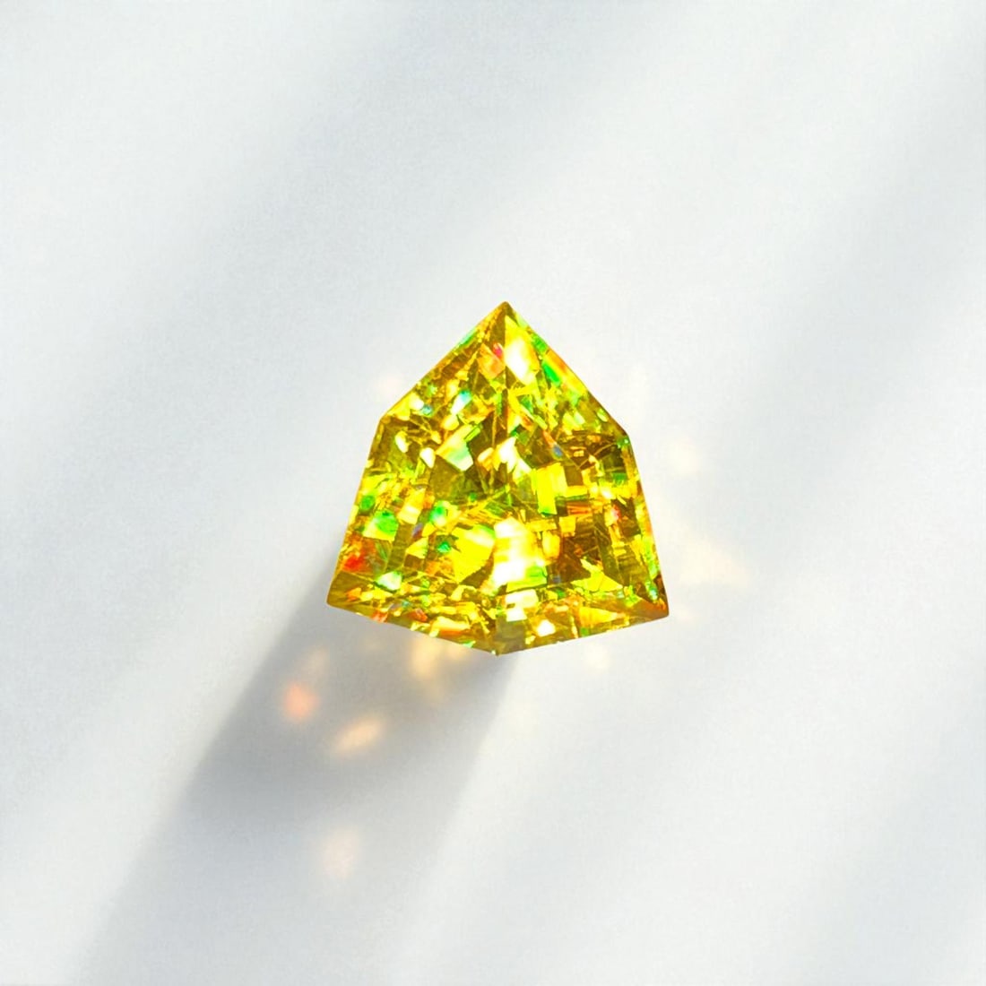 Full Fire Sphene Ring Stone, Natural Sphene Titanite Gemstone For Ring: Title: Full Fire Sphene Ring Stone, Natural Sphene Titanite Gemstone For Ring Description: Dimensions (mm) 9.3 x 9 x 5.7 mm Weight (cts) 2.8 Triangle Colours Description Full Fire Sphene Ring Stone, N