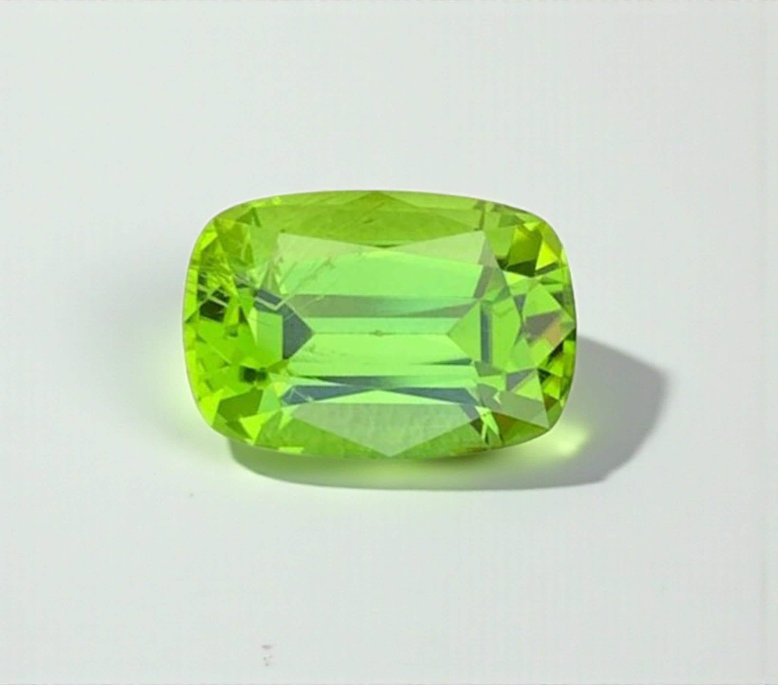 Cushion Cut Peridot Gemstone: Natural August Birthstone, Pakistan Origin (3.94 carats): Title: Cushion Cut Peridot Gemstone: Natural August Birthstone, Pakistan Origin (3.94 carats) Description: Gemstone: Peridot Carat weight: 3.94 Natural Peridot Gemstones, Cushion Cut Peridot Loose