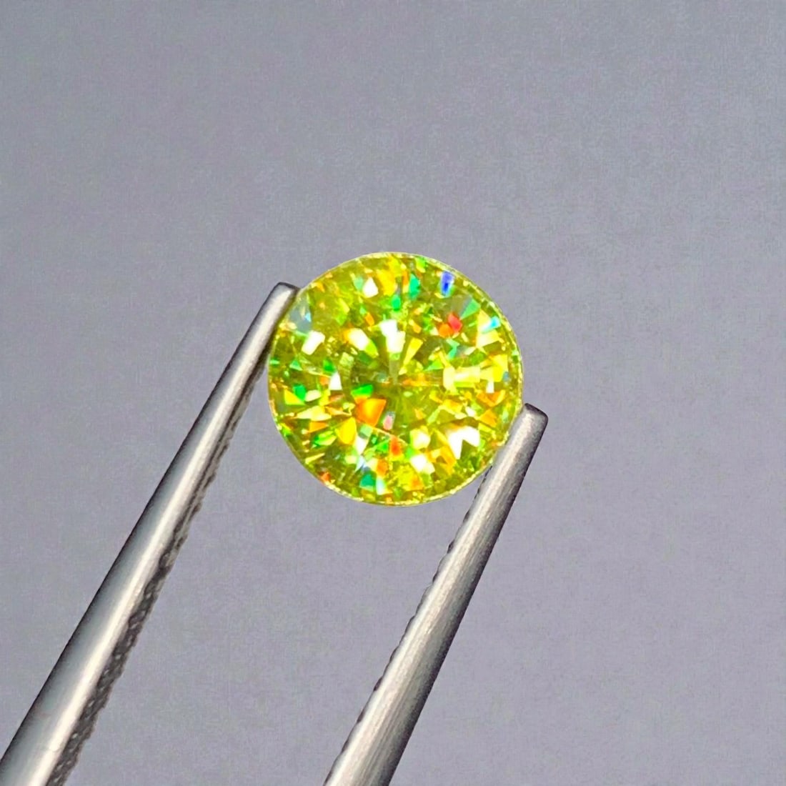 Full Fire Sphene Titanite Gemstone, Yellowish Green Sphene Ring Stone: Title: Full Fire Sphene Titanite Gemstone, Yellowish Green Sphene Ring Stone Description: Dimensions (mm) 6.3 x 4.5 x 4 mm Weight (cts) 1.45 Round Colours Description Full Fire Sphene Titanite Gemston