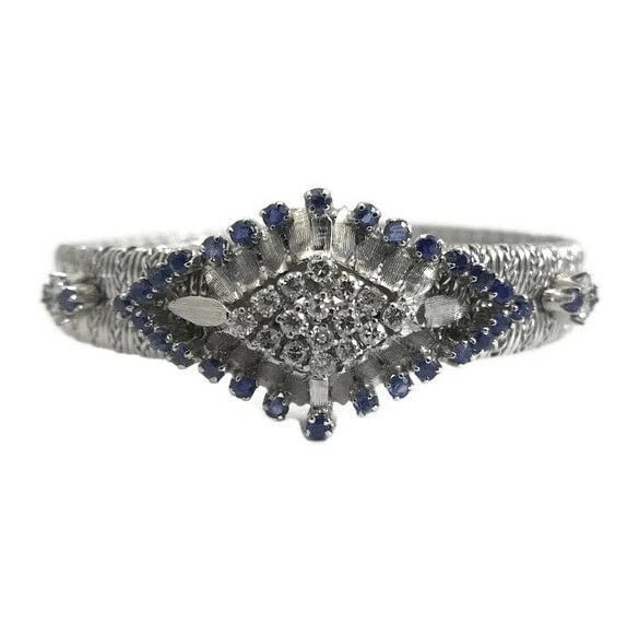 Vintage Blue Sapphire Diamond Geometric Cluster Bracelet 18K White Gold, 32.3 Gr: Vintage Blue Sapphire Diamond Geometric Cluster Bracelet 18K White Gold, 32.3 Grams This beautiful one-of-a-kind vintage bracelet will add style to any outfit. Please let us know if you have any