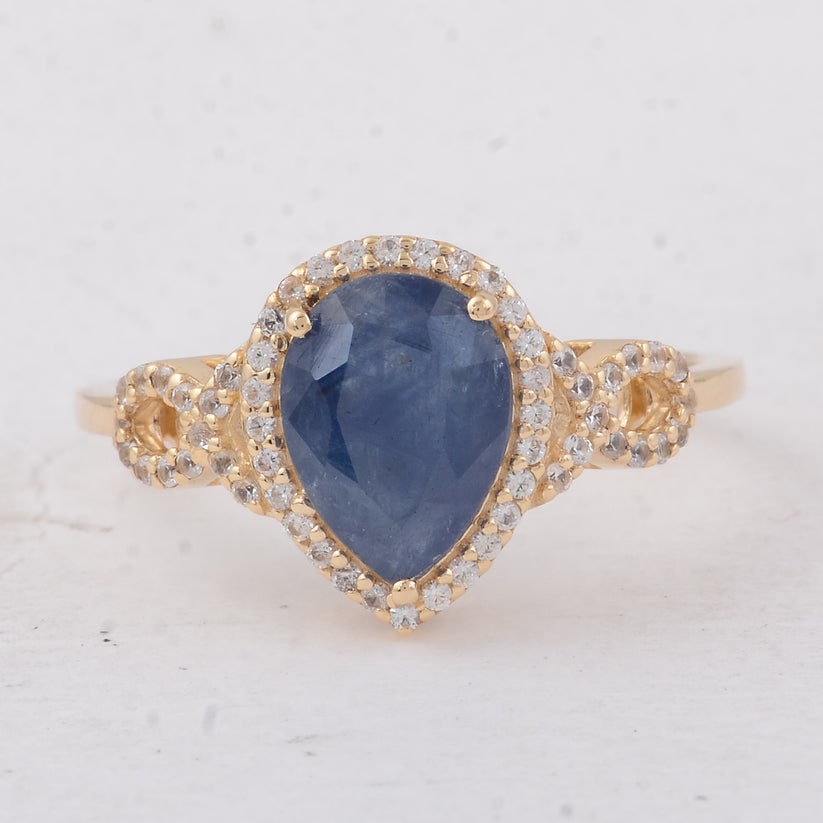 2.53 Ct Pear Sapphire 9K Gold Ring: 2.53 Total Carat Sapphire 9K Gold Ring Specifications: Total Weight 2.27 g Center Gemstone Sapphire Gemstone Carat Weight 2.3 Carats Gemstone Measurements 9.20X6.80X4.20 mm Additional Gemstones White