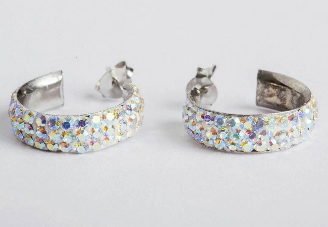 Sterling Silver Aurora Borealis Rhinestone Hoop Earrings: Title:Sterling Silver Aurora Borealis Rhinestone Hoop Earrings Description:Sparkling, hoop, pave in rhinestones earrings. Dead stock vintage. Circa 1980’s. The earrings measure 5/8” in
