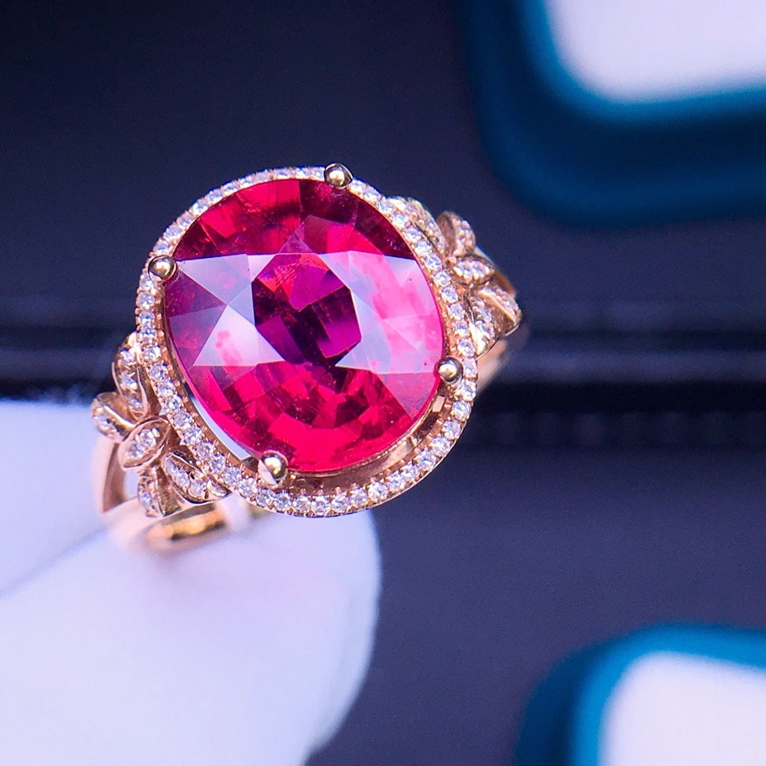 14K GOLD 4.5 CT NATURAL TOURMALINE & DIAMOND RING: Title:14K GOLD 4.5 CT NATURAL TOURMALINE & DIAMOND RING Description:Ref:230656378Gold Content:14K GoldRing Size:7.25USMain Gemstone:TourmalineNumber of stones:1Shape:OvalCarat Weight:4.5ct Color:Rubel